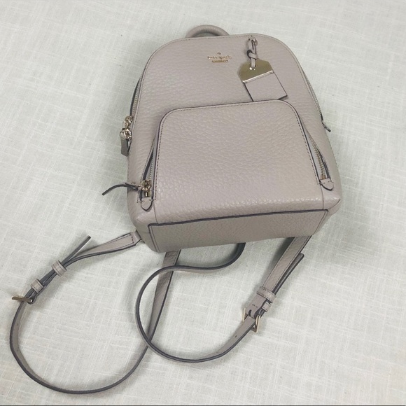 kate spade Handbags - Kate Spade Gray Leather Backpack